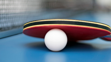 Table Tennis ball and racquet